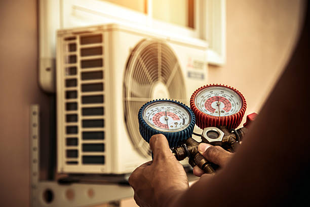 Professional Air Conditioning Service technician working in Pendleton, KY